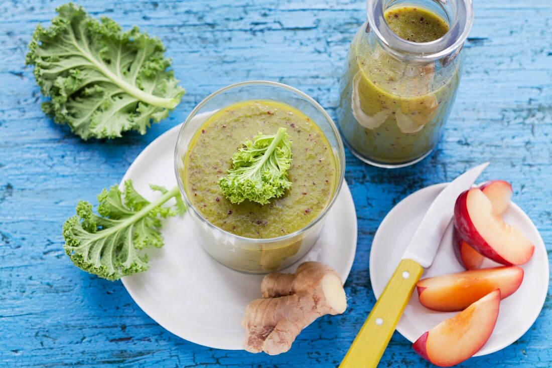 A plum and kiwi smoothie made with chard, kale, apples and ginger