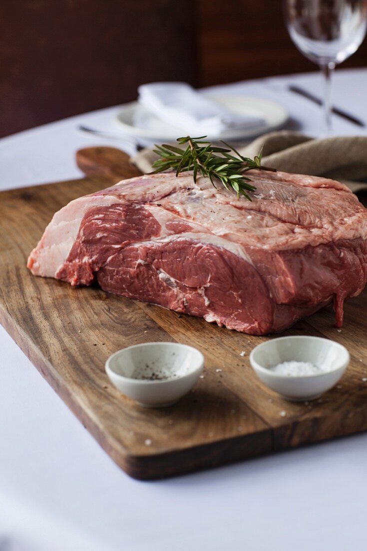 Raw lamb with salt and rosemary