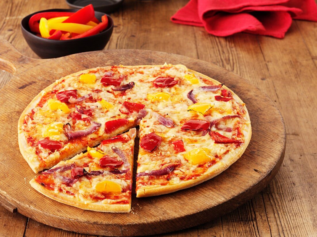 Vegetable pizza with peppers, sliced