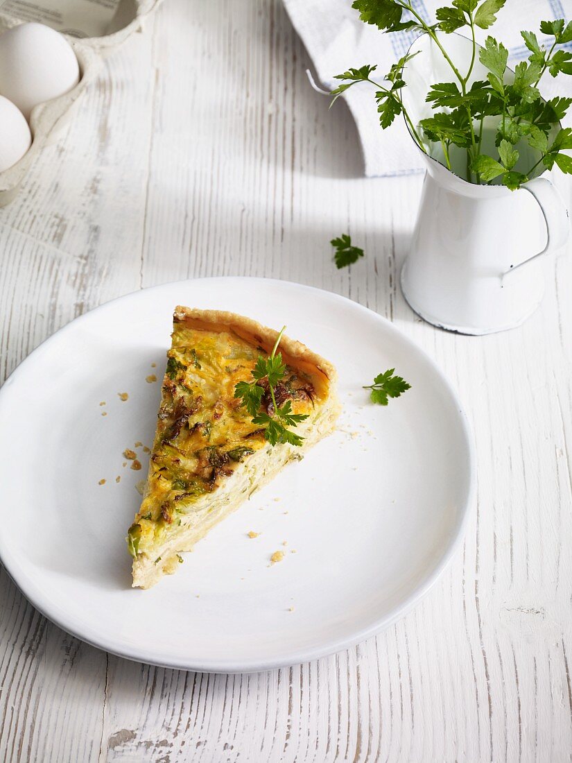 A slice of cabbage and gorgonzola quiche