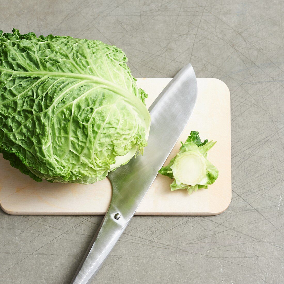 Savoy cabbage being sliced