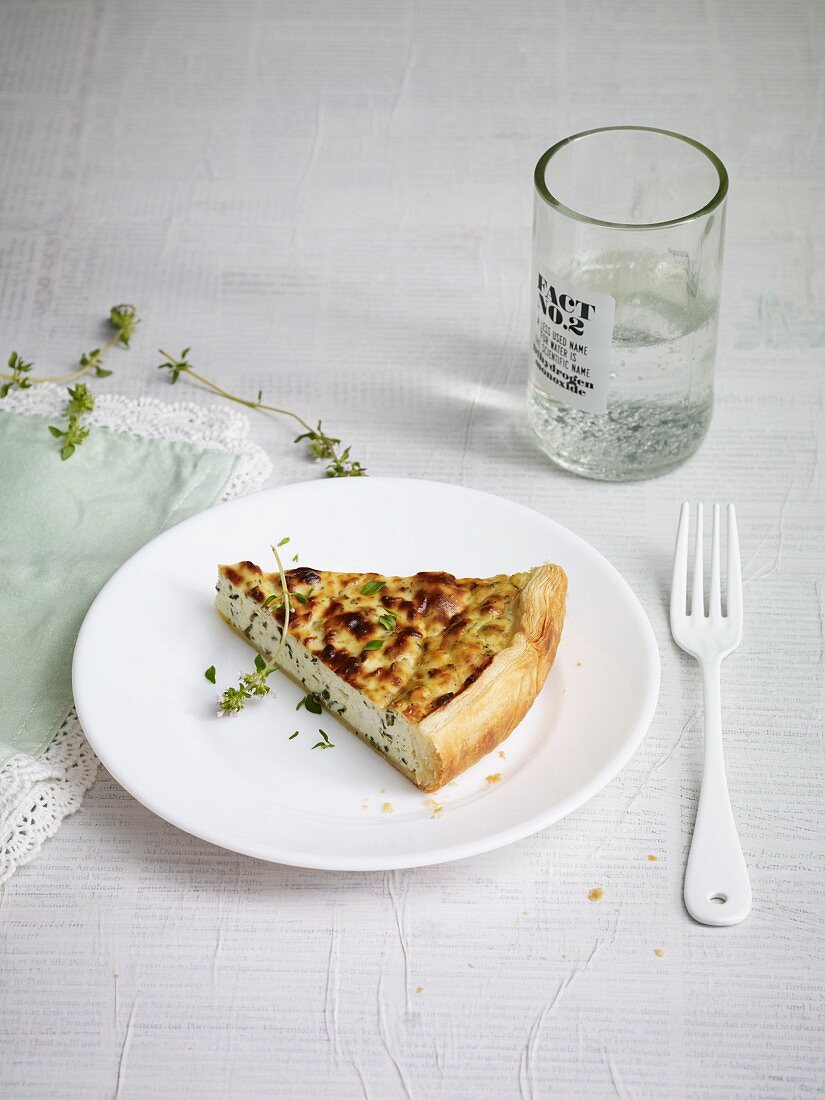 A slice of ricotta and herb quiche