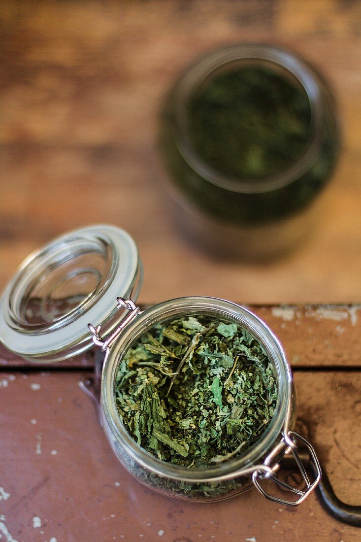 A dried herb mixture in a preserving jar