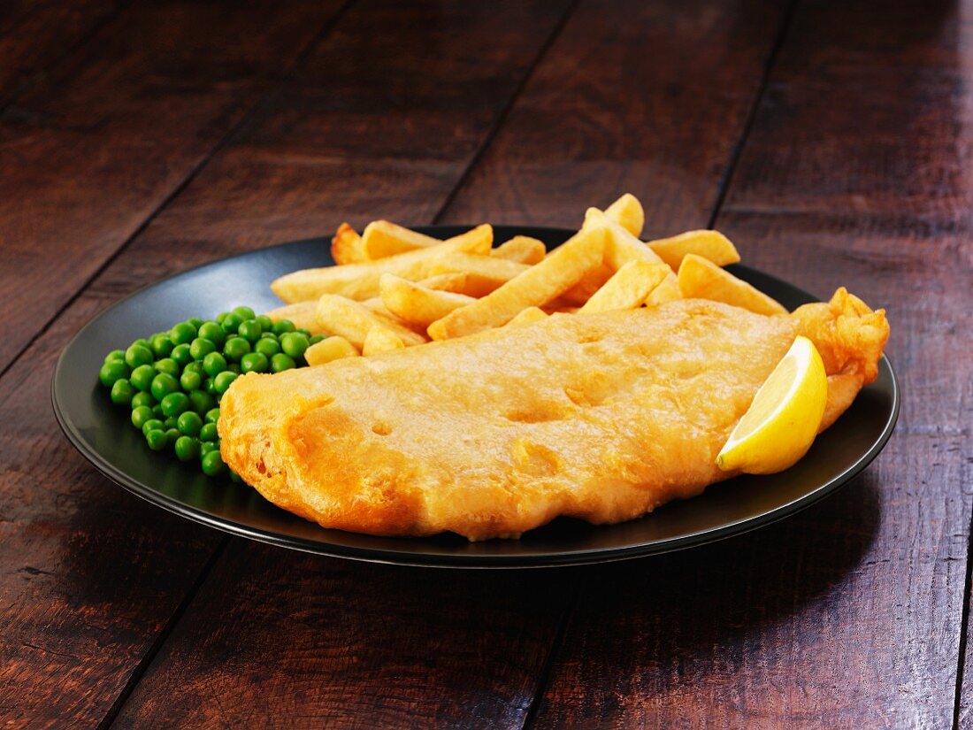 Battered cod with chips and peas