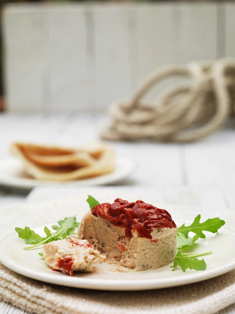Tuna terrine with roasted peppers, pita bread and rocket