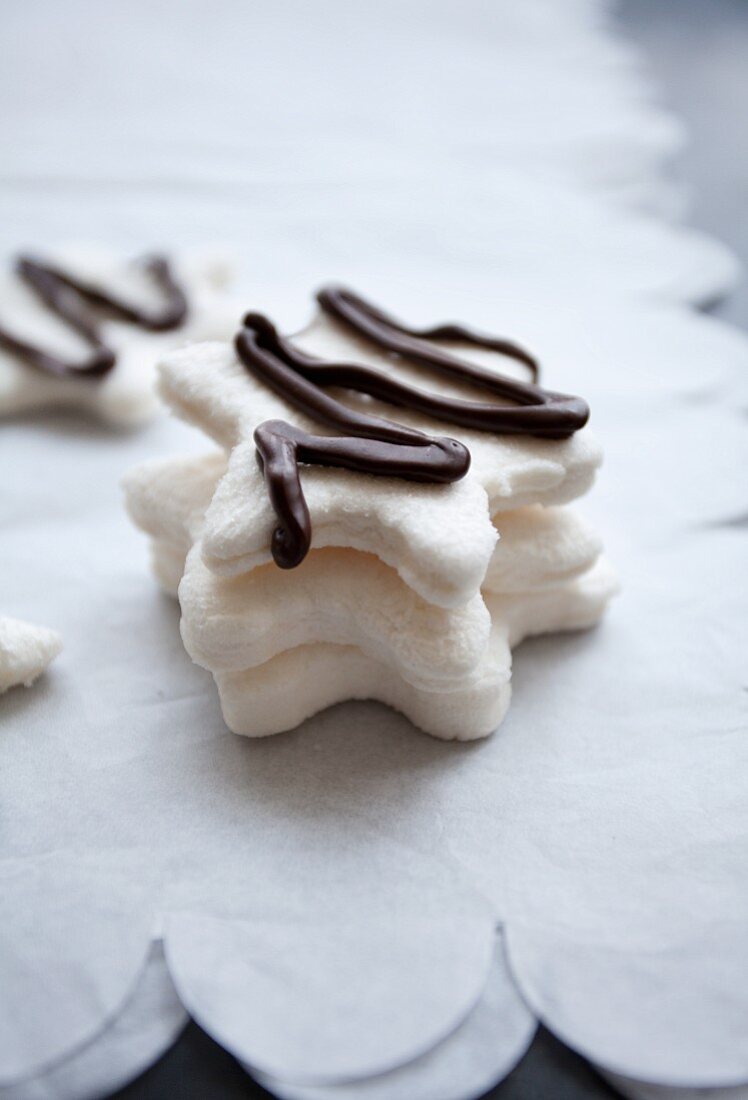 White marshmallow stars decorated with chocolate