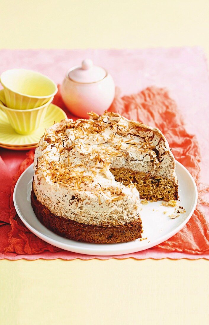 Sliced wholemeal carrot cake with coconut meringue