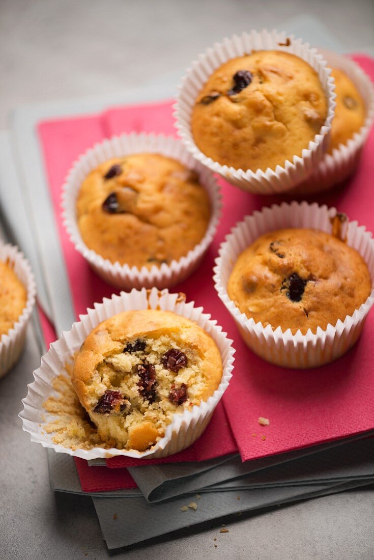 Cranberry muffins on a pink napkin