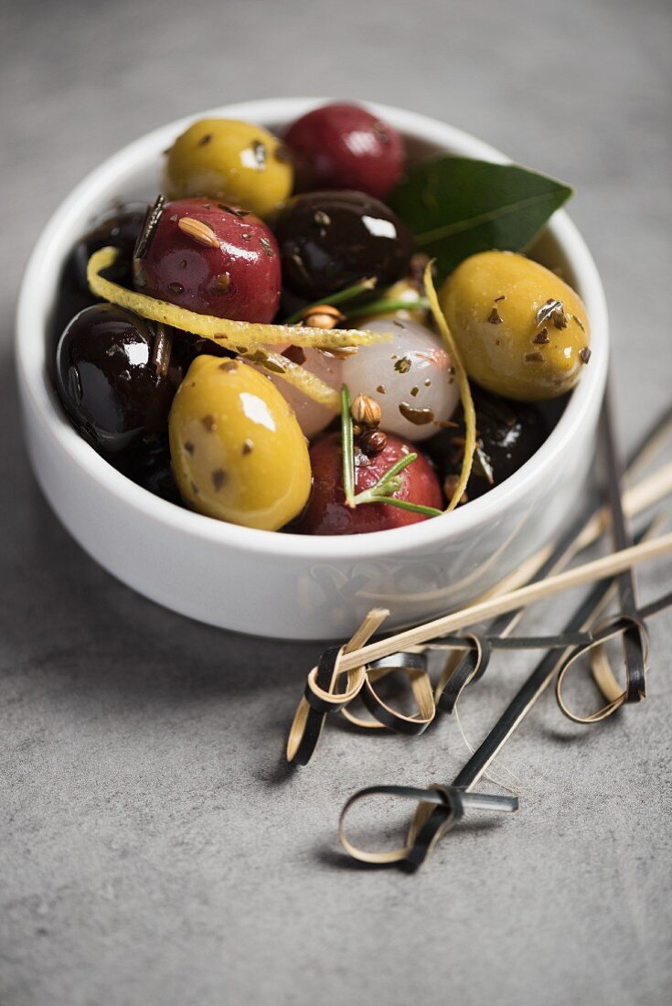 Olives and pearl onions with herbs in a red wine vinegar and olive oil vinaigrette