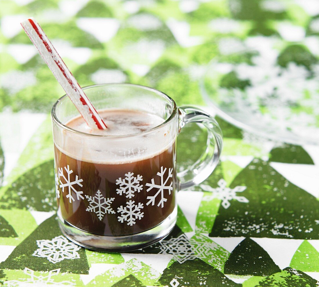 Hot chocolate with a stick of peppermint rock