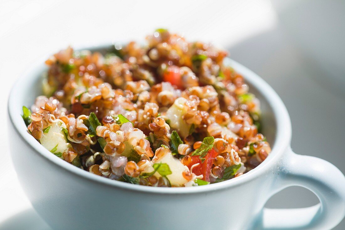 A cup of quinoa salad