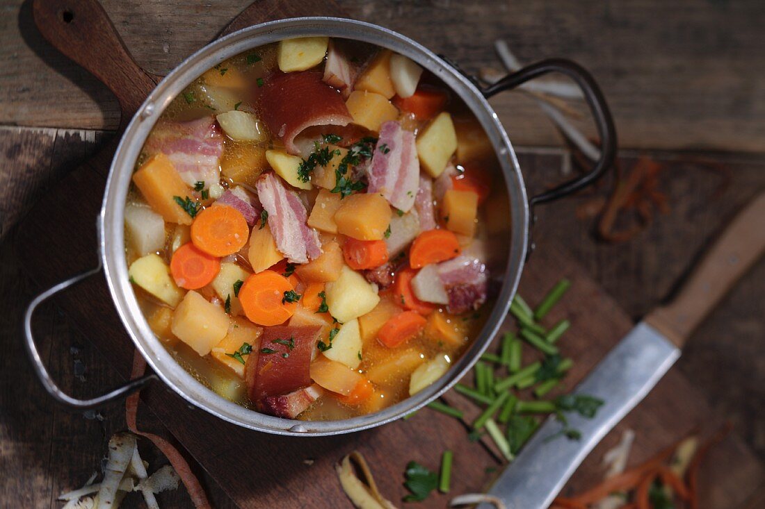 Turnip soup with bacon and carrots