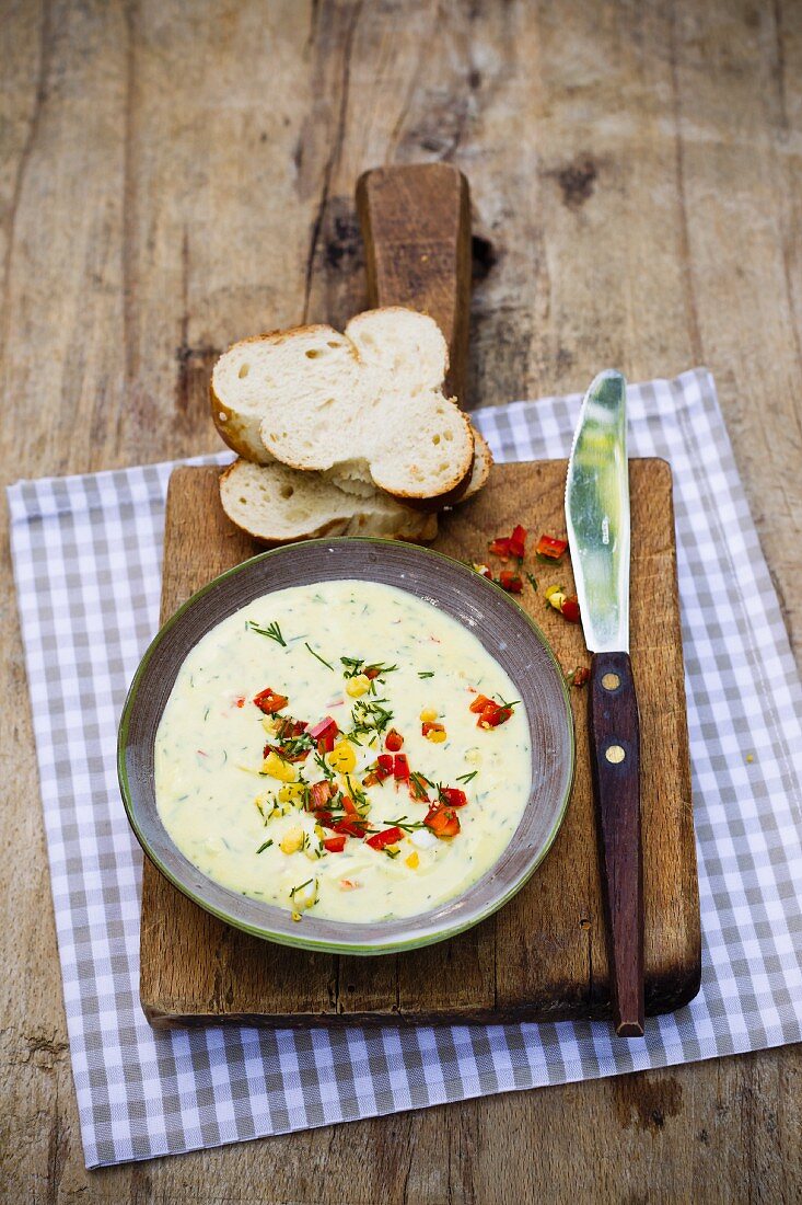 An egg and mustard dip with pointed peppers