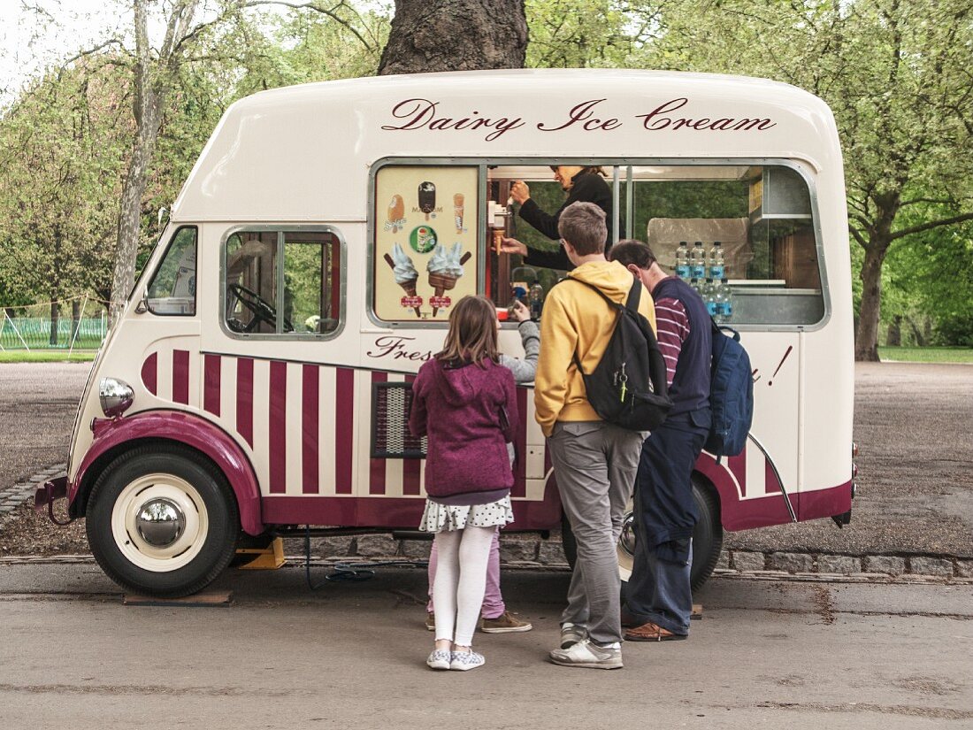 An ice cream van in a park in London, England