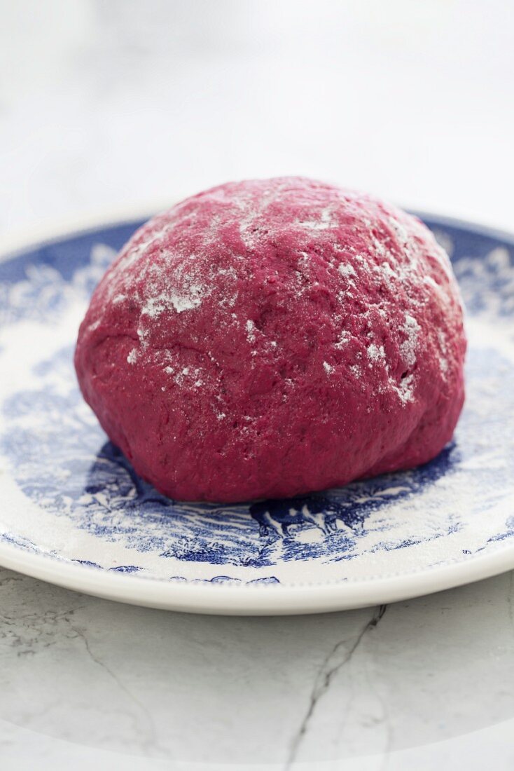 A ball of beetroot pasta dough