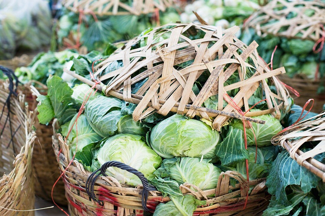 Baskets of cabbages at a market in China Town, Bangkok, Thailand