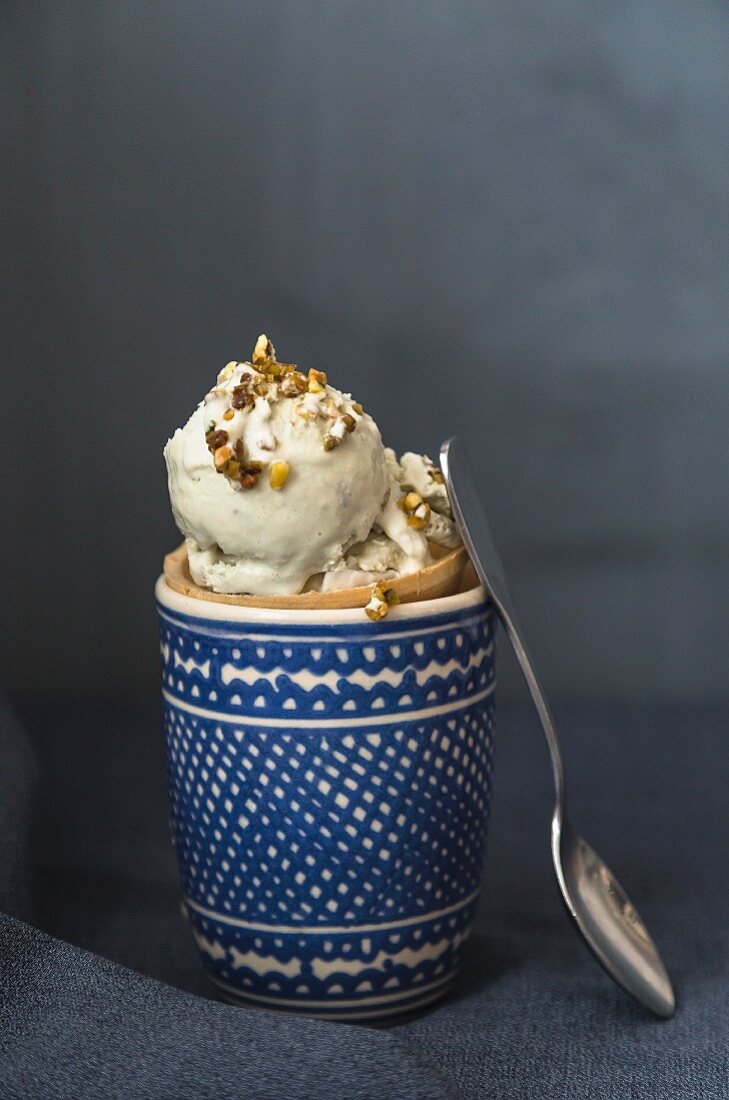 Pistachio ice cream in a cone