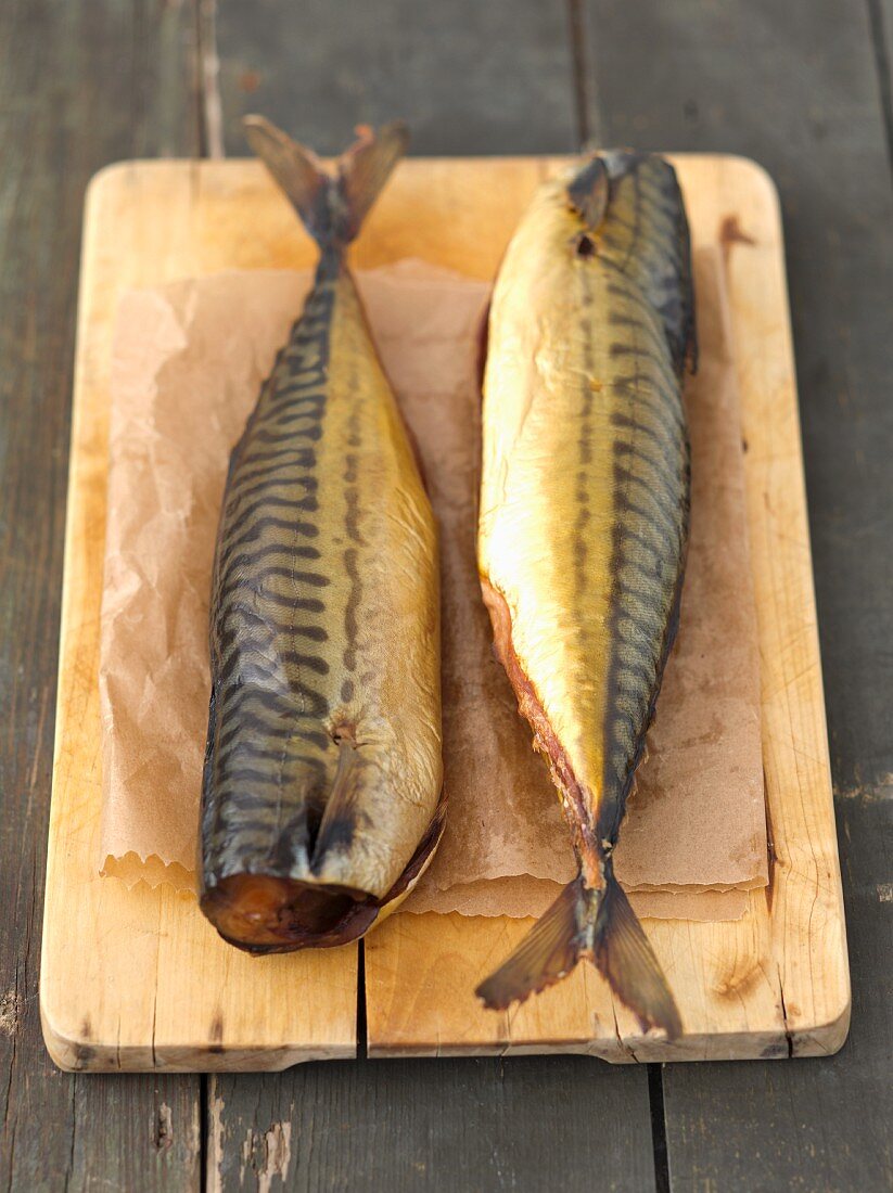 Smoked mackerel on a chopping board