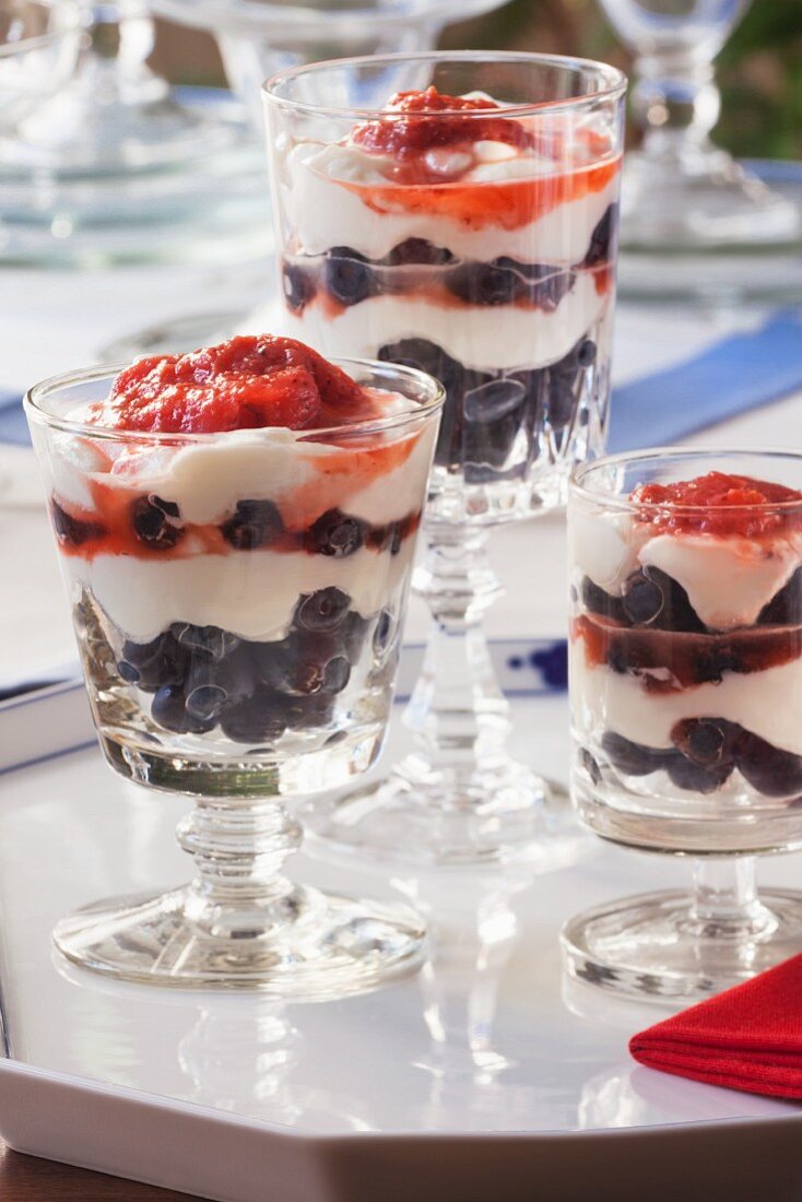 Parfait with cream, strawberries and blueberries for the 4th July (USA)
