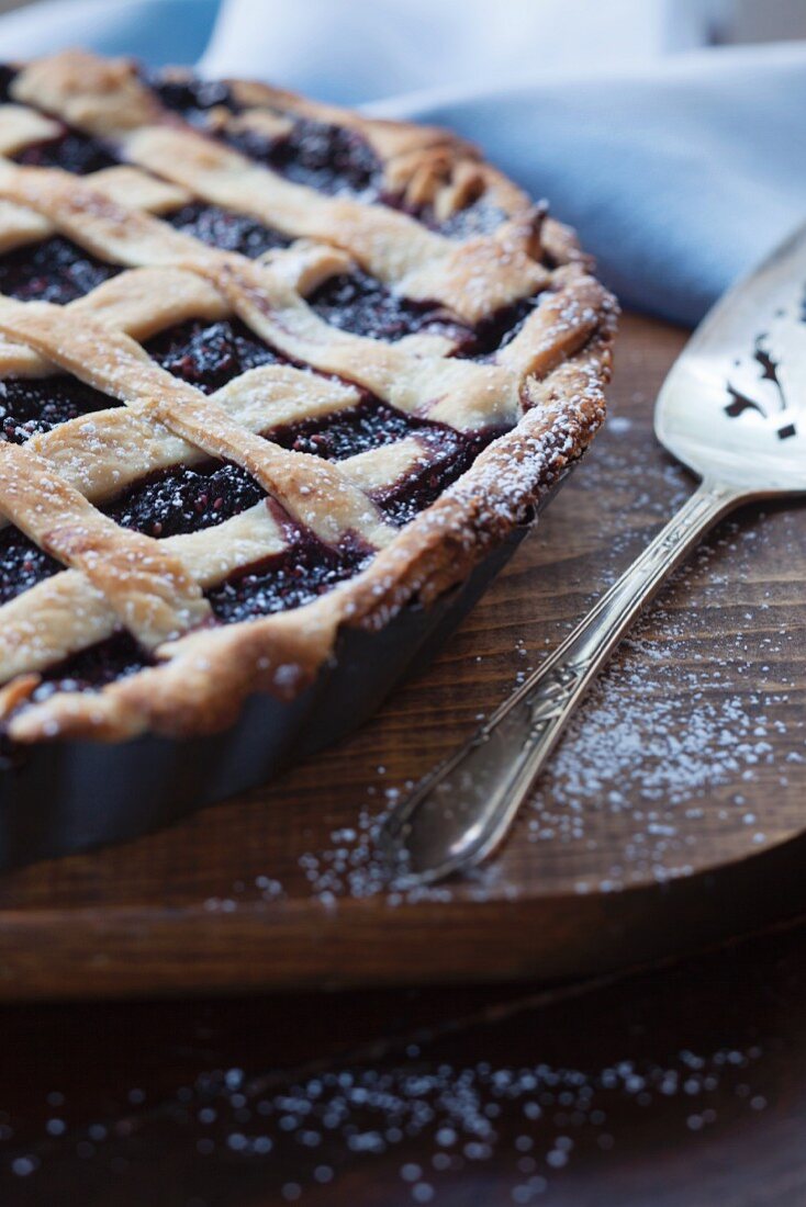 Freshly baked mulberry pie with a lattice crust