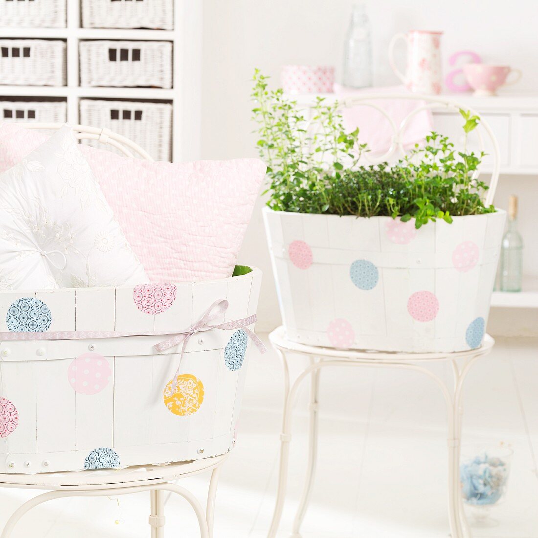 Wooden boxes painted with polka dots on delicate, metal garden chairs