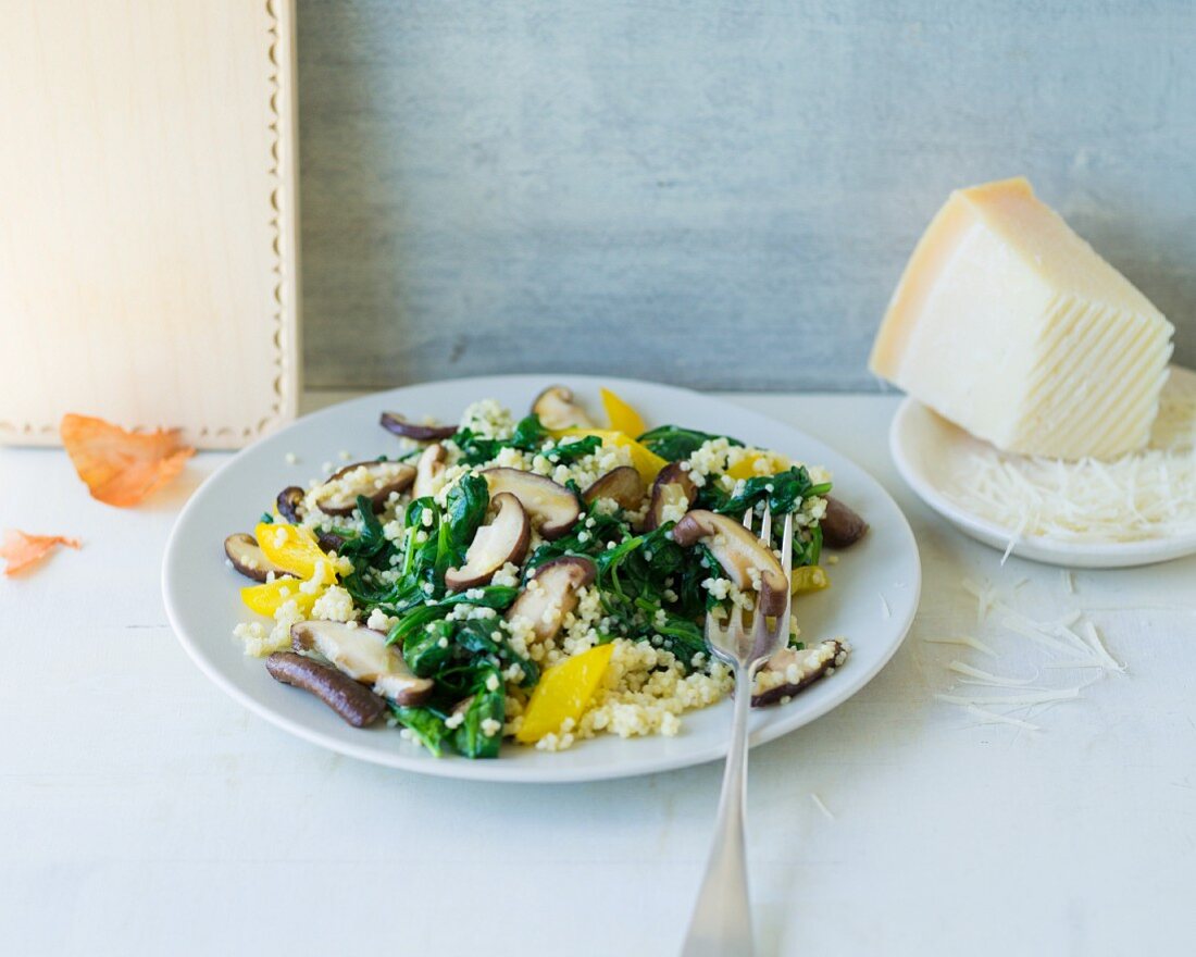 Spinach with millet and shiitake mushrooms