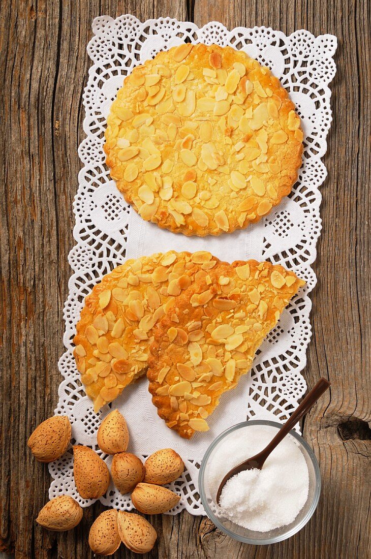 Sables with flaked almonds on a doily