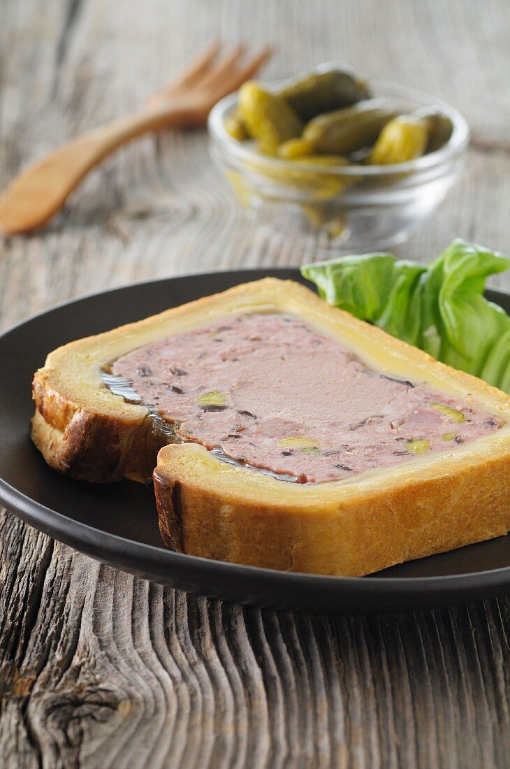 Pastry-wrapped pâté with gherkins