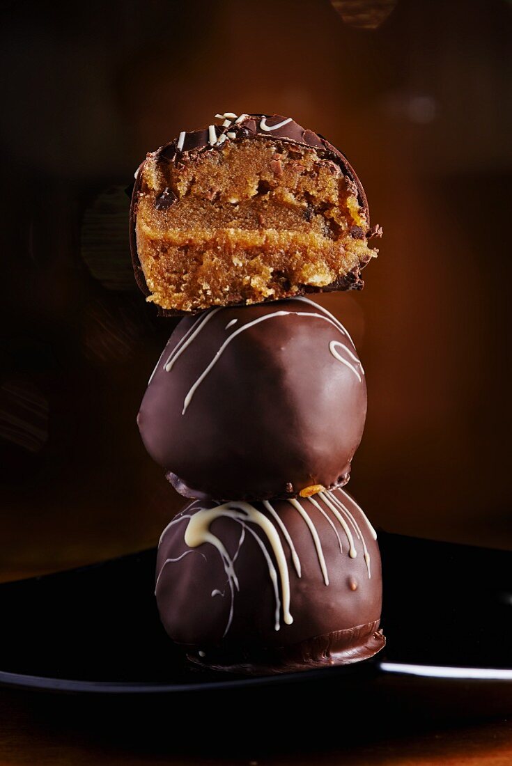 A stack of pralines with a halved praline on top