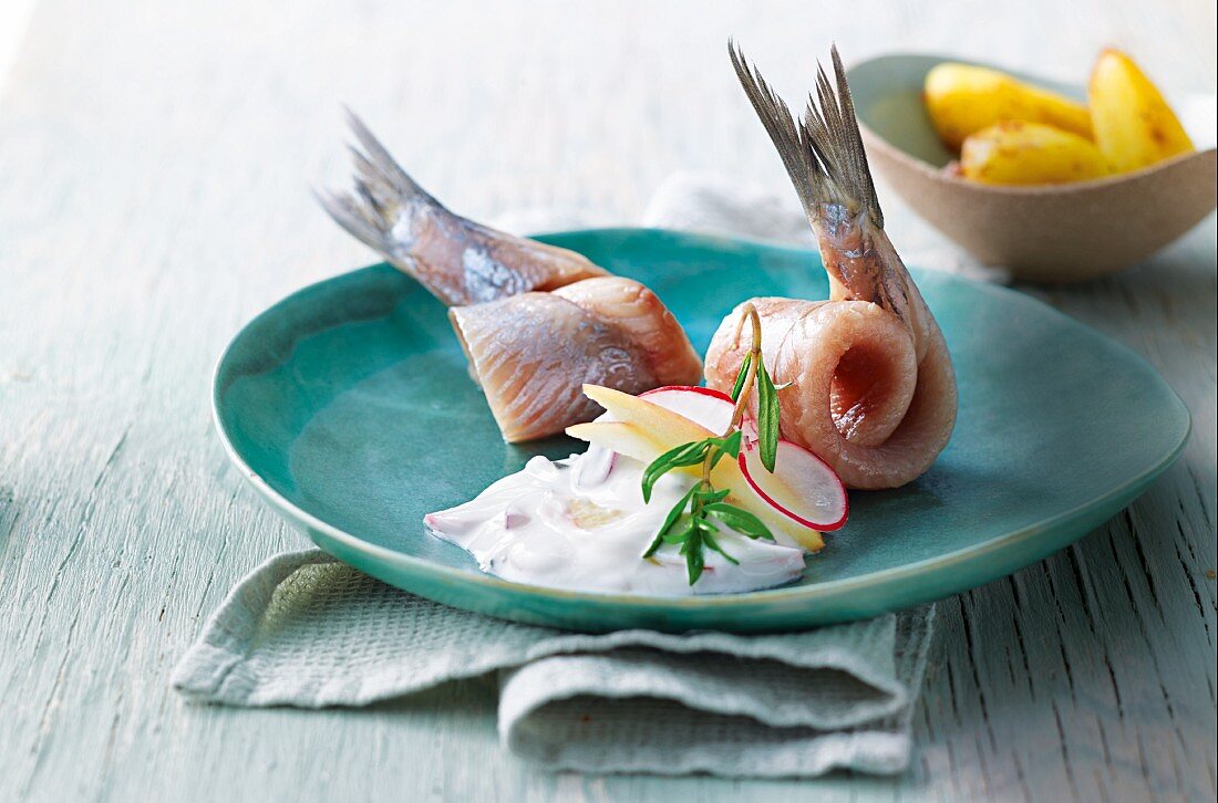 Soused herring with apple and radish sour cream