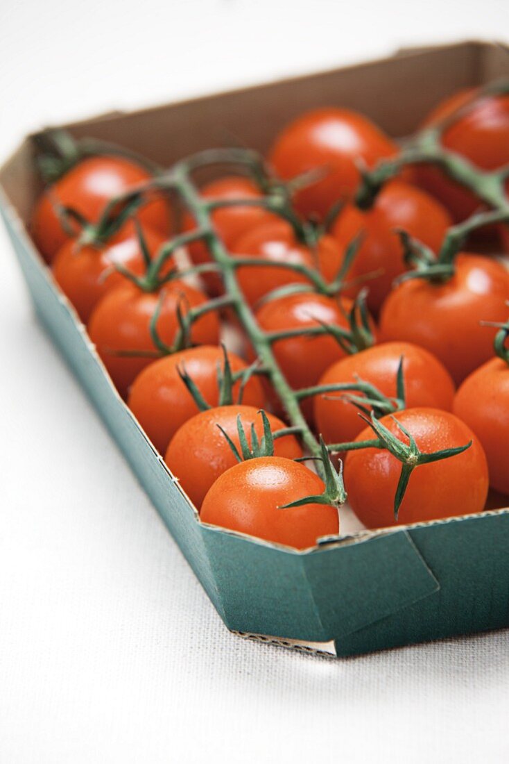 Cherry tomatoes in a cardboard tray