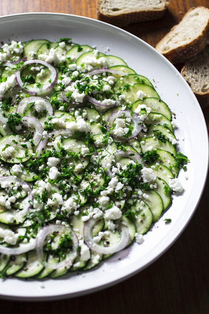 Courgette carpaccio with herbs, onions and feta cheese