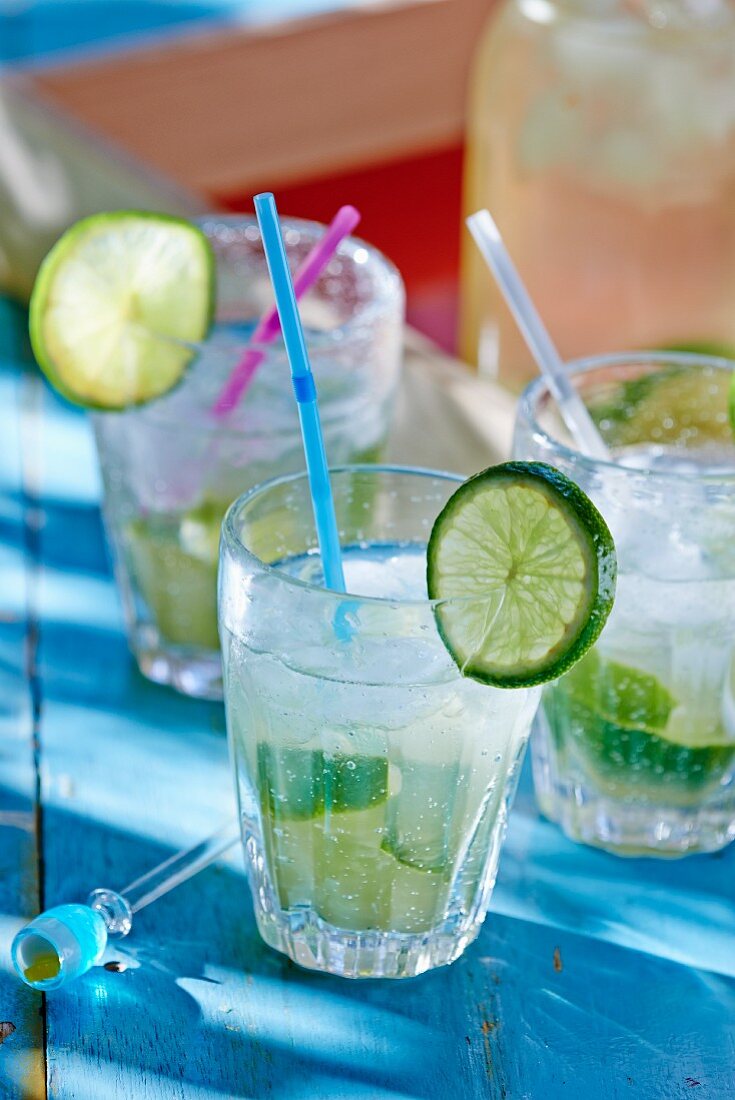 Cocktails with ice and limes