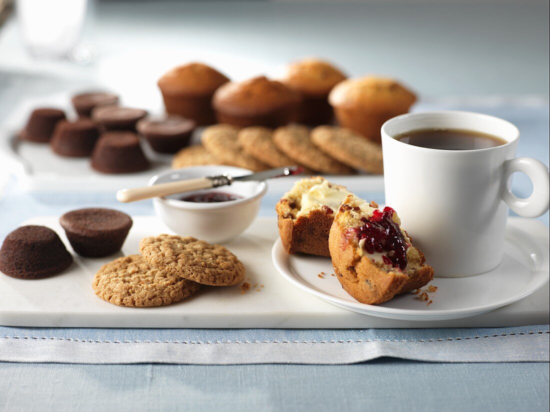 Coffee, muffins, jam and biscuits