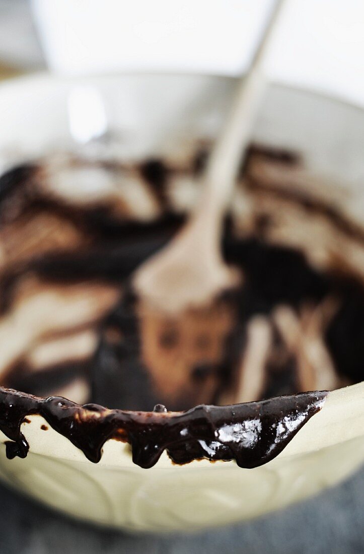 The remains of chocolate glaze in a bowl