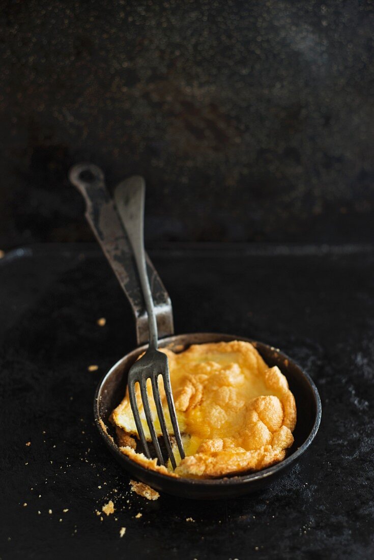 A foamy omelette in a pan