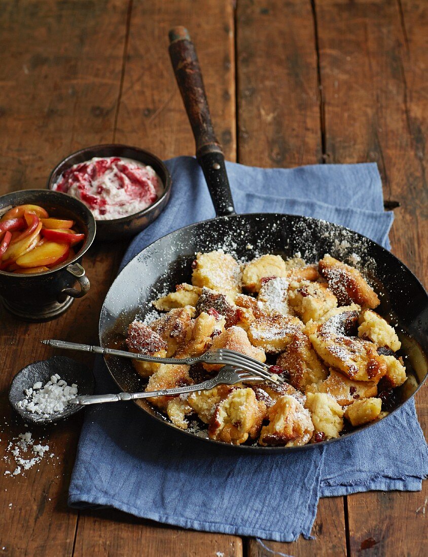 Shredded pancakes with apples and lingonberry cream