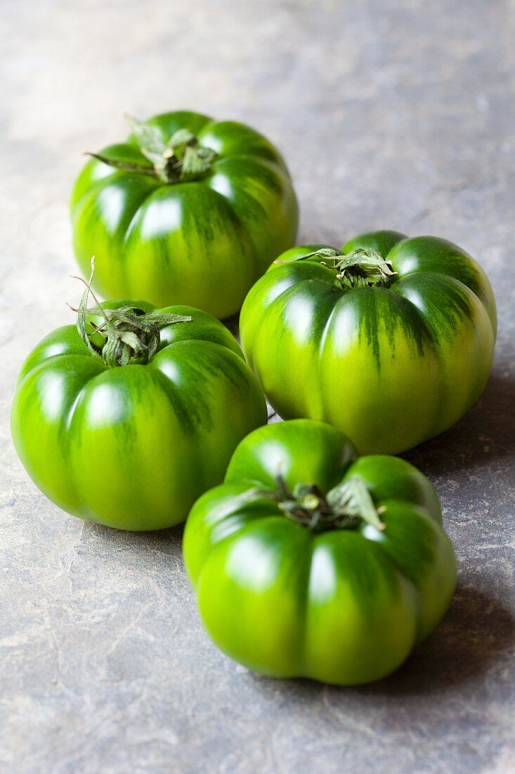 Vier grüne Tomaten