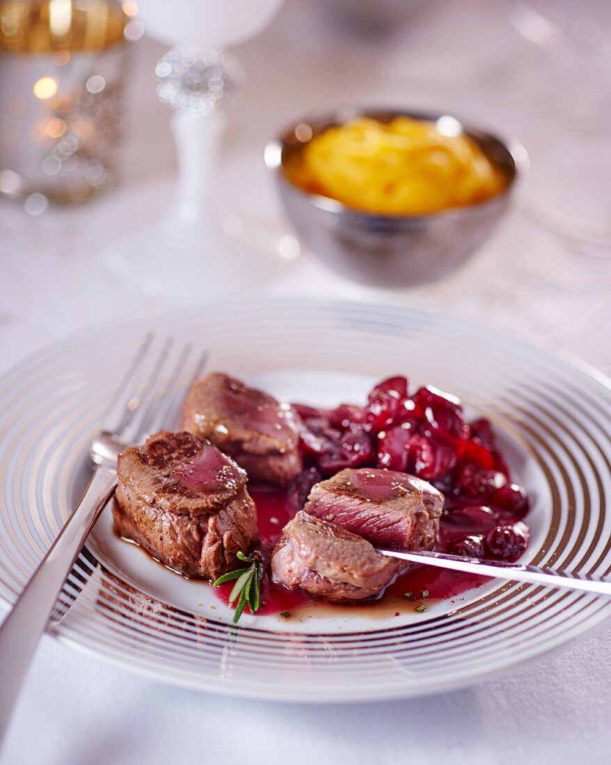 Venison medallions with cranberry sauce for Christmas