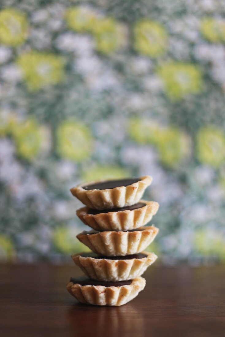 A stack of chocolate tartlets