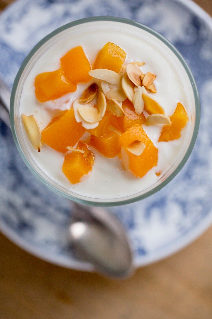 Peach quark with flaked almonds