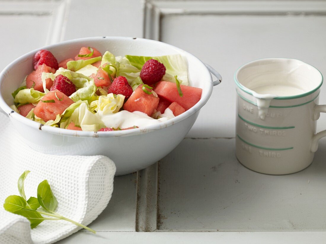 Lettuce with watermelon, raspberries and basil