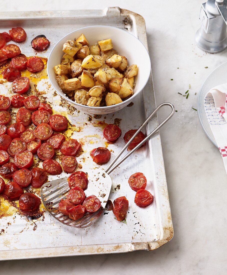 Oven-roasted tomatoes with caraway potatoes