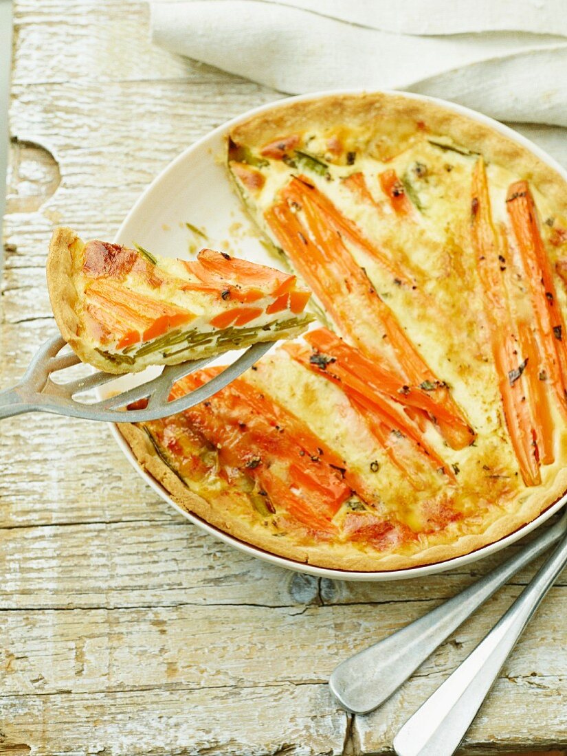 Mange tout and carrot tart, sliced