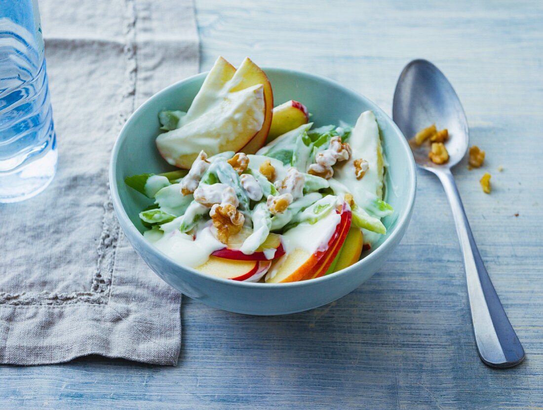 Celery salad with apples, walnuts and a yoghurt dressing