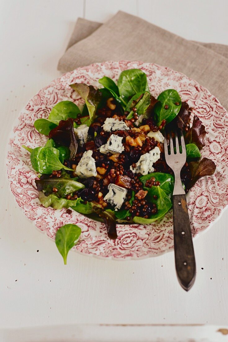 French beluga lentil salad with anchovies, dried fruit and bleu d'Auvergne cheese