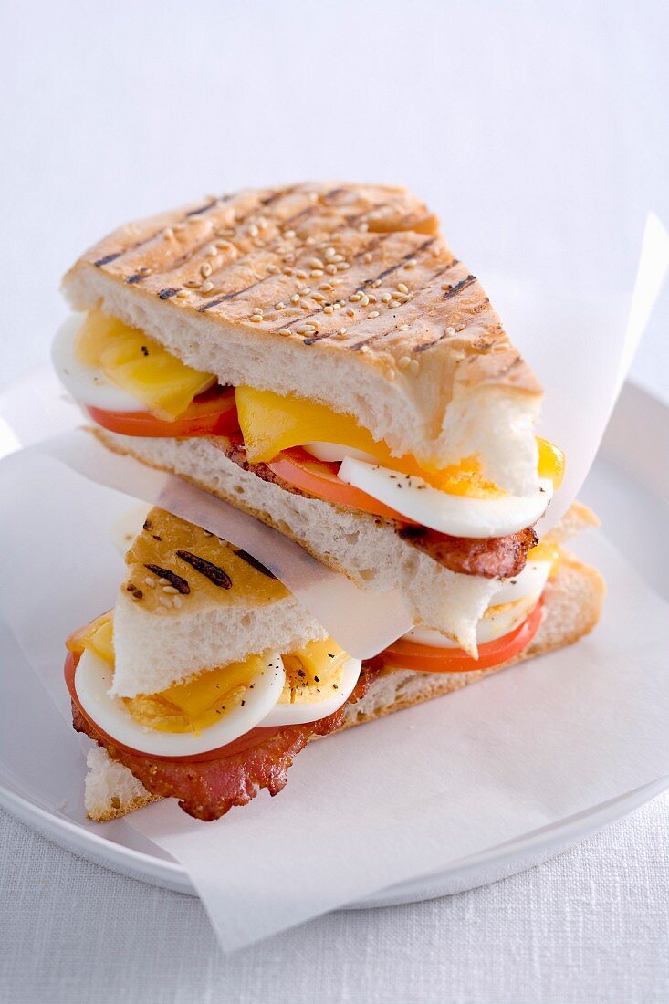 Pita bread sandwiches with bacon and egg