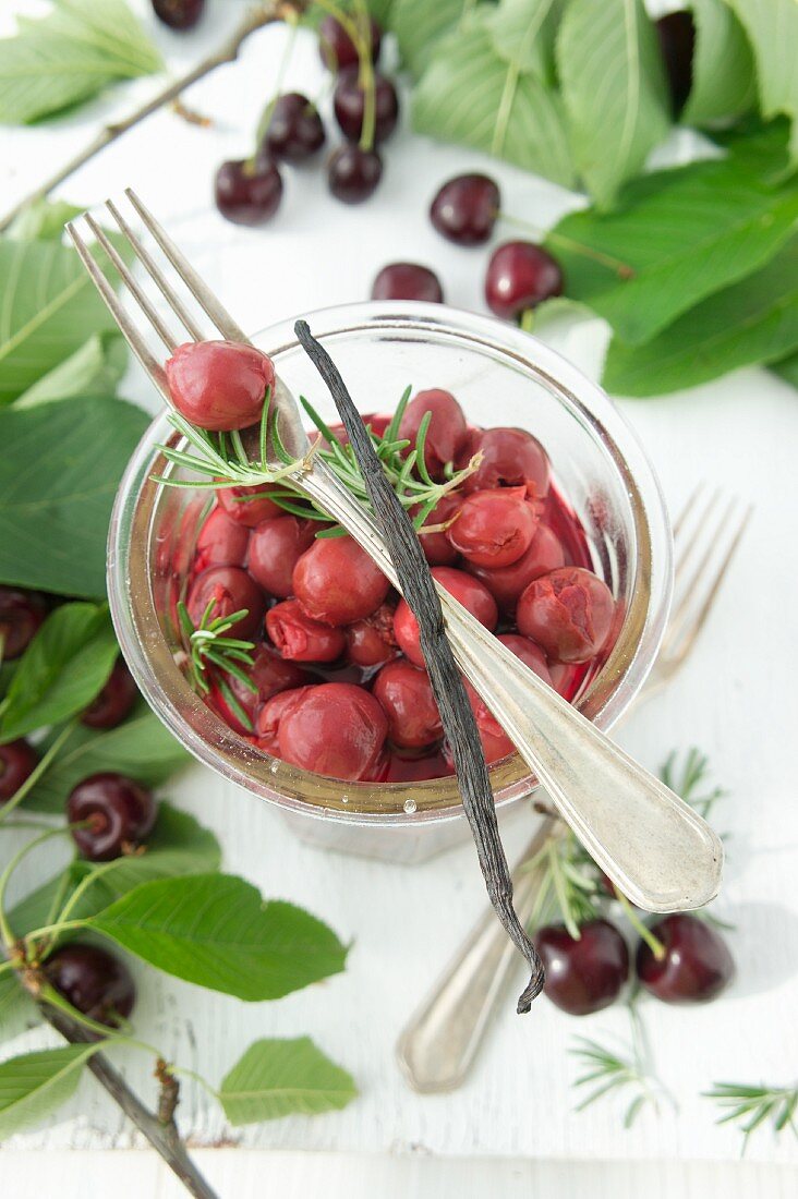 Preserved cherries with rosemary and vanilla pods