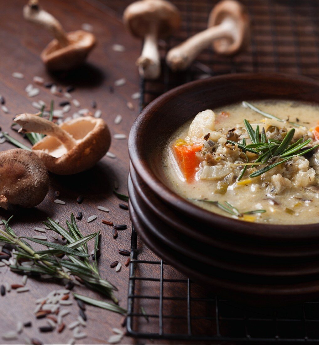 Soup with shitake mushrooms, wild rice and rosemary