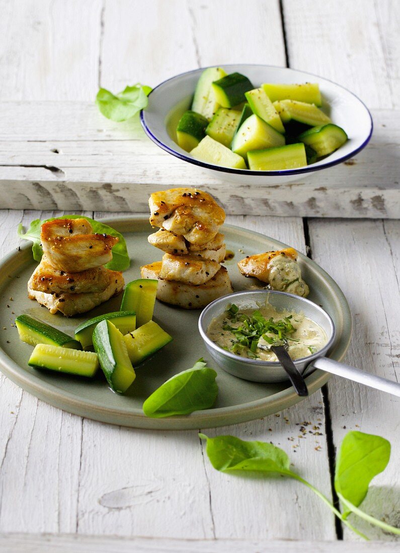 Chicken breast with sorrel cream and courgettes